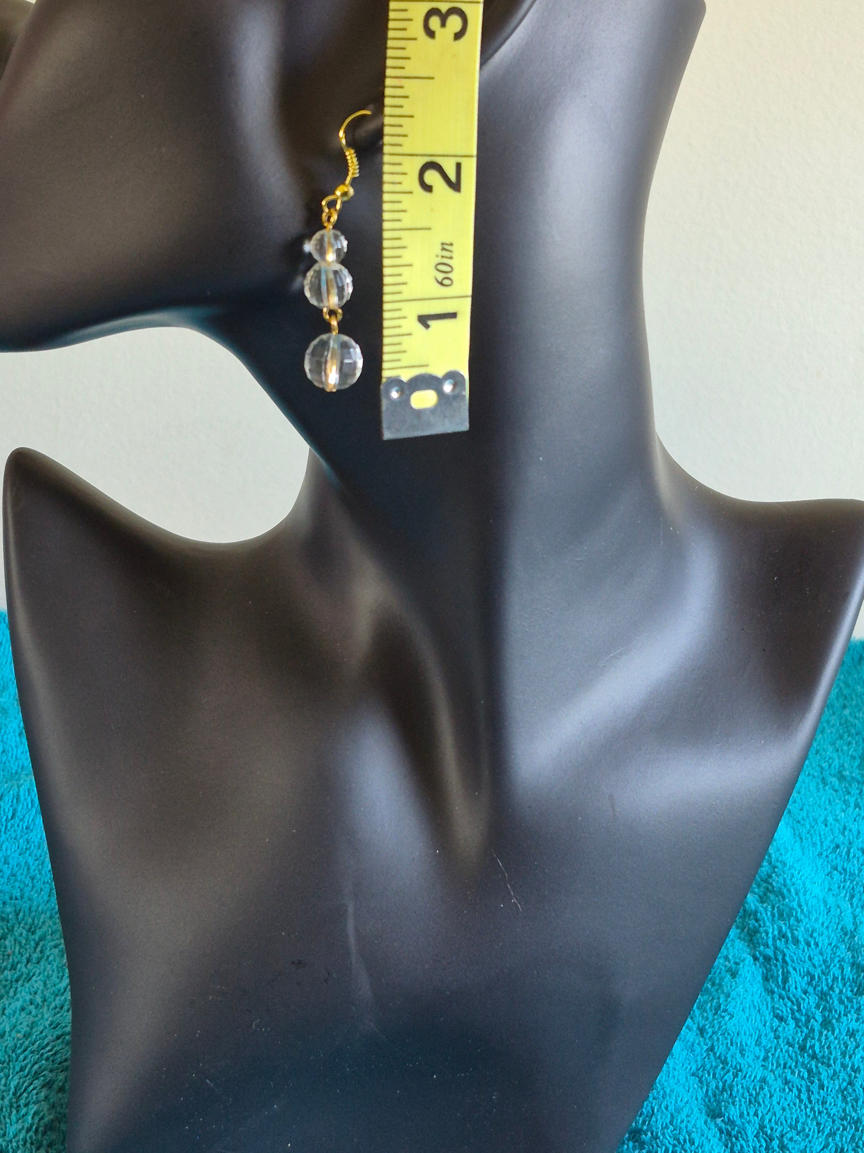 Crystal clear acrylic bead and gold colored hook earrings